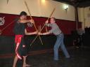 Fighting with bamboo poles